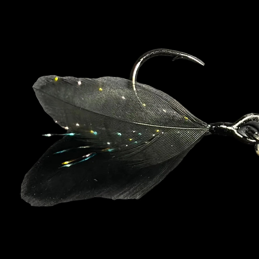 The 3.9” Yough Bow Jerkbait Series 3 Black Rainbow Flash (Feathered Single Hook)